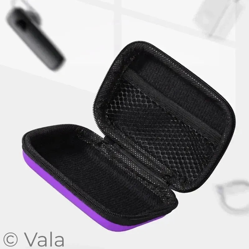 Black and purple hard-shell travel case on a white background