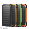 Four solar power banks in black, orange, green, and orange with black accents on a white background.