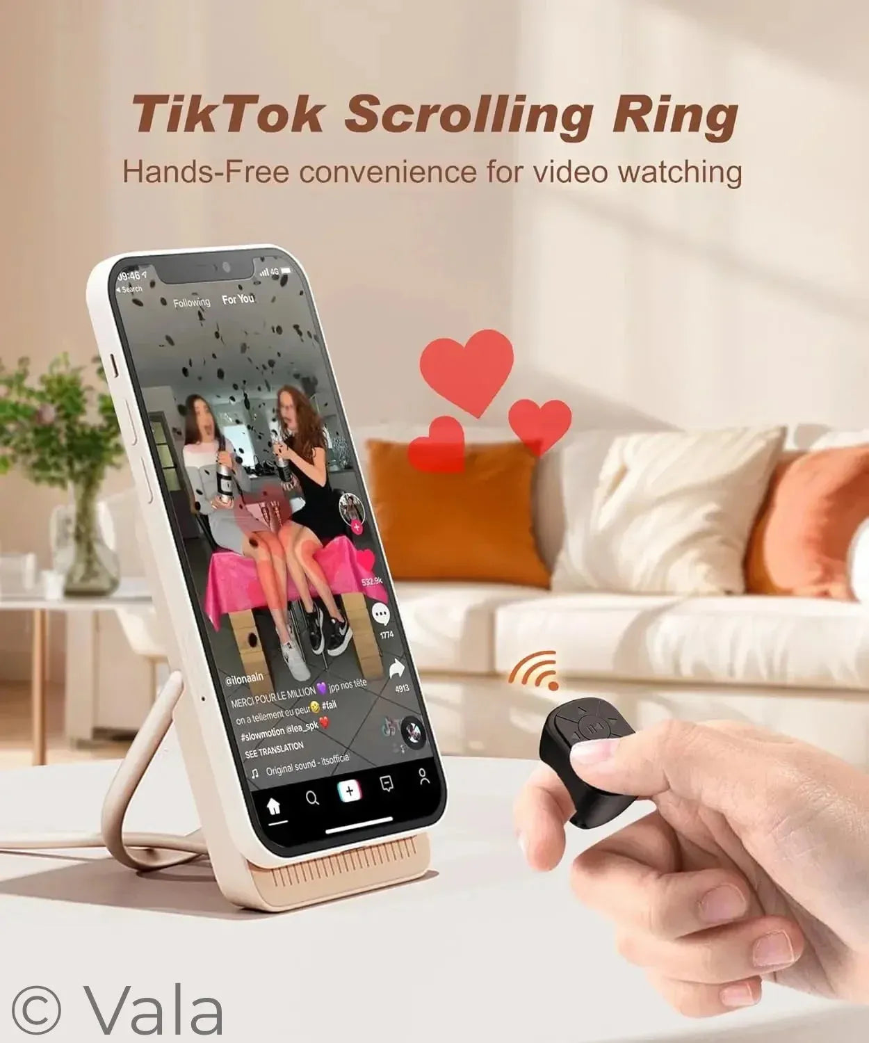 TikTok Scrolling Ring with smartphone and hand holding the ring on a living room background